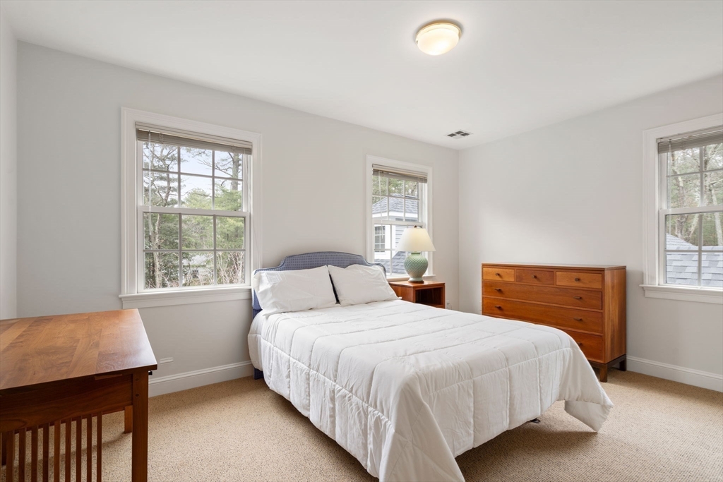 5 Powisset Street Dover, MA 02030 - Photo 27 of 41 a bedroom with a bed and a window