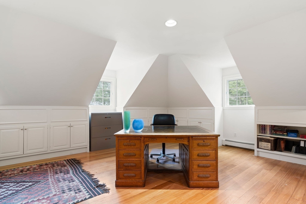 5 Powisset Street Dover, MA 02030 - Photo 35 of 41 a living room with furniture and a rug