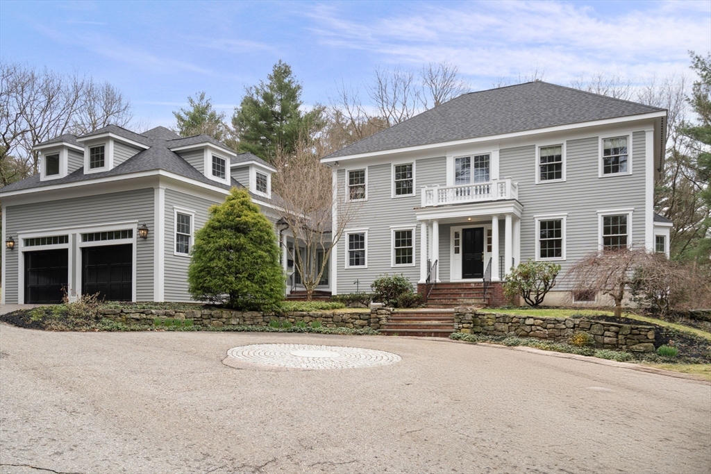 5 Powisset Street Dover, MA 02030 - Photo 5 of 41 front view of a house with a yard