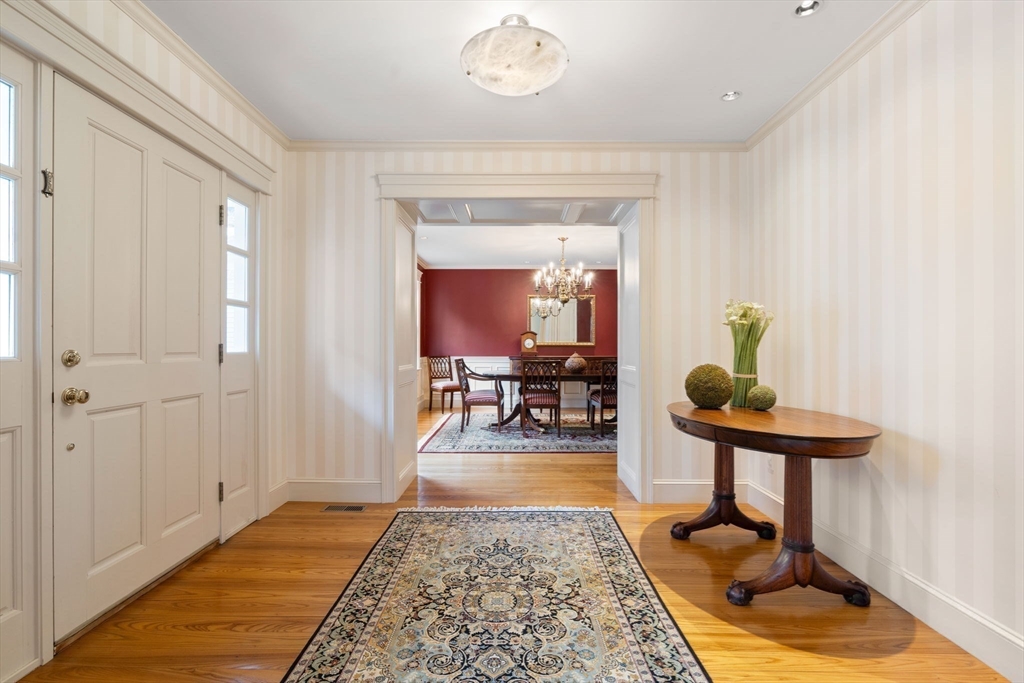 5 Powisset Street Dover, MA 02030 - Photo 7 of 41 a living room with furniture and a table