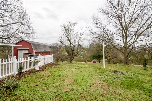 1009 Mitchell Road Nashville, TN 37206 - Photo 12 of 15 View from sun room. Notice the storage shed. There is another one at the end of the back yard.