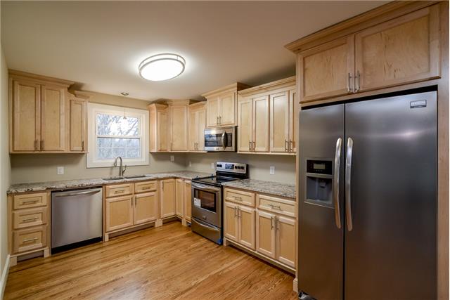 Featuring New custom cabinents, New Appliances, and great granite!
