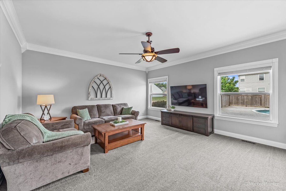 313 Market Street Genoa, IL 60135 - Photo 12 of 49 a living room with furniture and a window