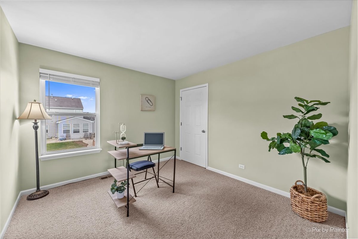 313 Market Street Genoa, IL 60135 - Photo 26 of 49 a view of a room with gym equipment