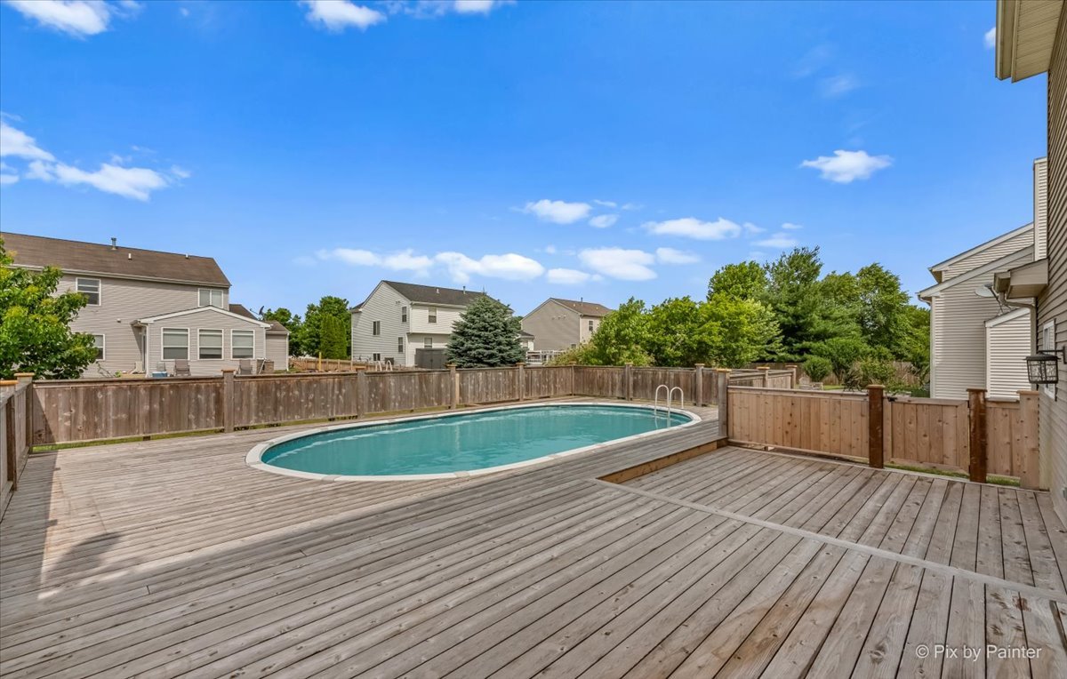 313 Market Street Genoa, IL 60135 - Photo 28 of 49 a view of a swimming pool with a patio