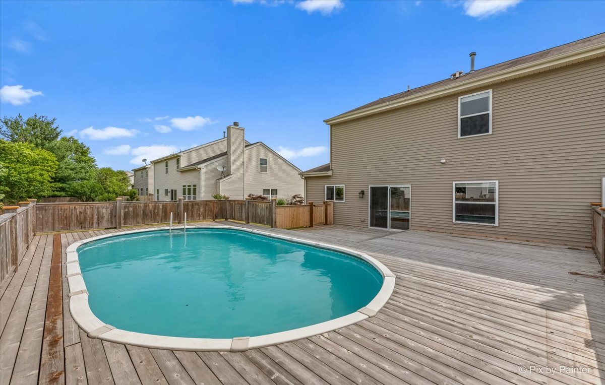 313 Market Street Genoa, IL 60135 - Photo 30 of 49 a view of outdoor space yard and balcony