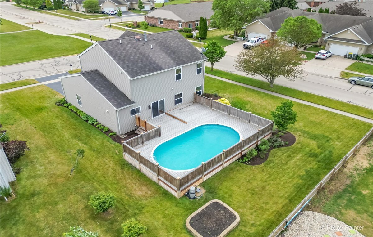 313 Market Street Genoa, IL 60135 - Photo 32 of 49 an aerial view of a house