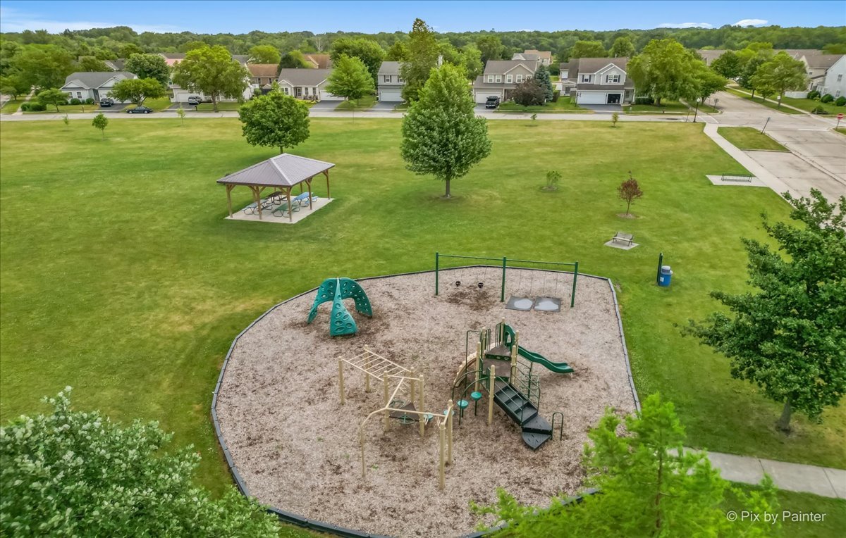 313 Market Street Genoa, IL 60135 - Photo 46 of 49 an aerial view of a house with big yard