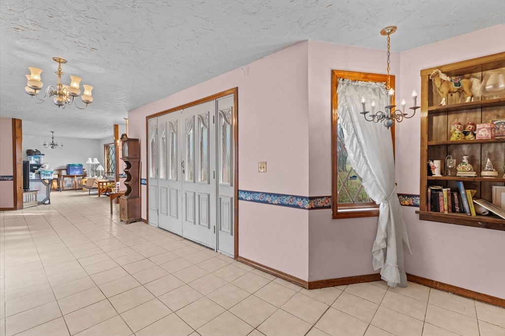 186 8 Lots Road Sutton, MA 01590 - Photo 14 of 33 a view of an entryway with workspace