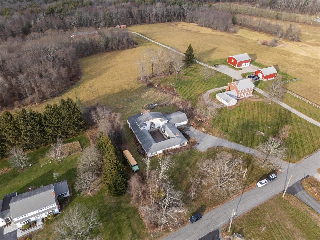 186 8 Lots Road Sutton, MA 01590 - Photo 2 of 33 an aerial view of a house with outdoor space