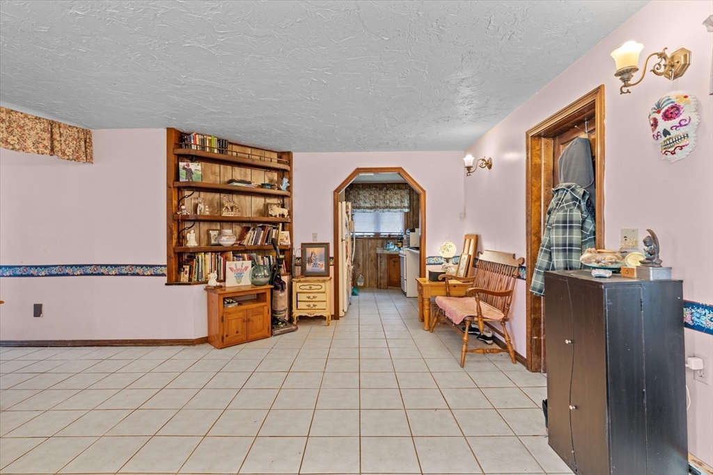 186 8 Lots Road Sutton, MA 01590 - Photo 22 of 33 a living room with furniture and natural light