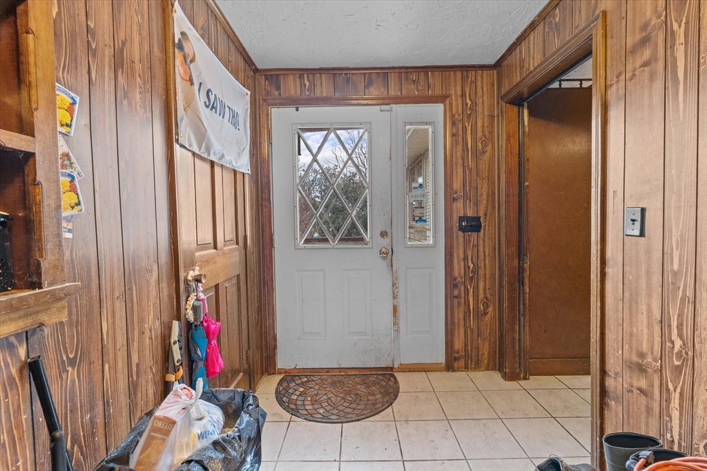 186 8 Lots Road Sutton, MA 01590 - Photo 7 of 33 a view of entryway with wooden floor