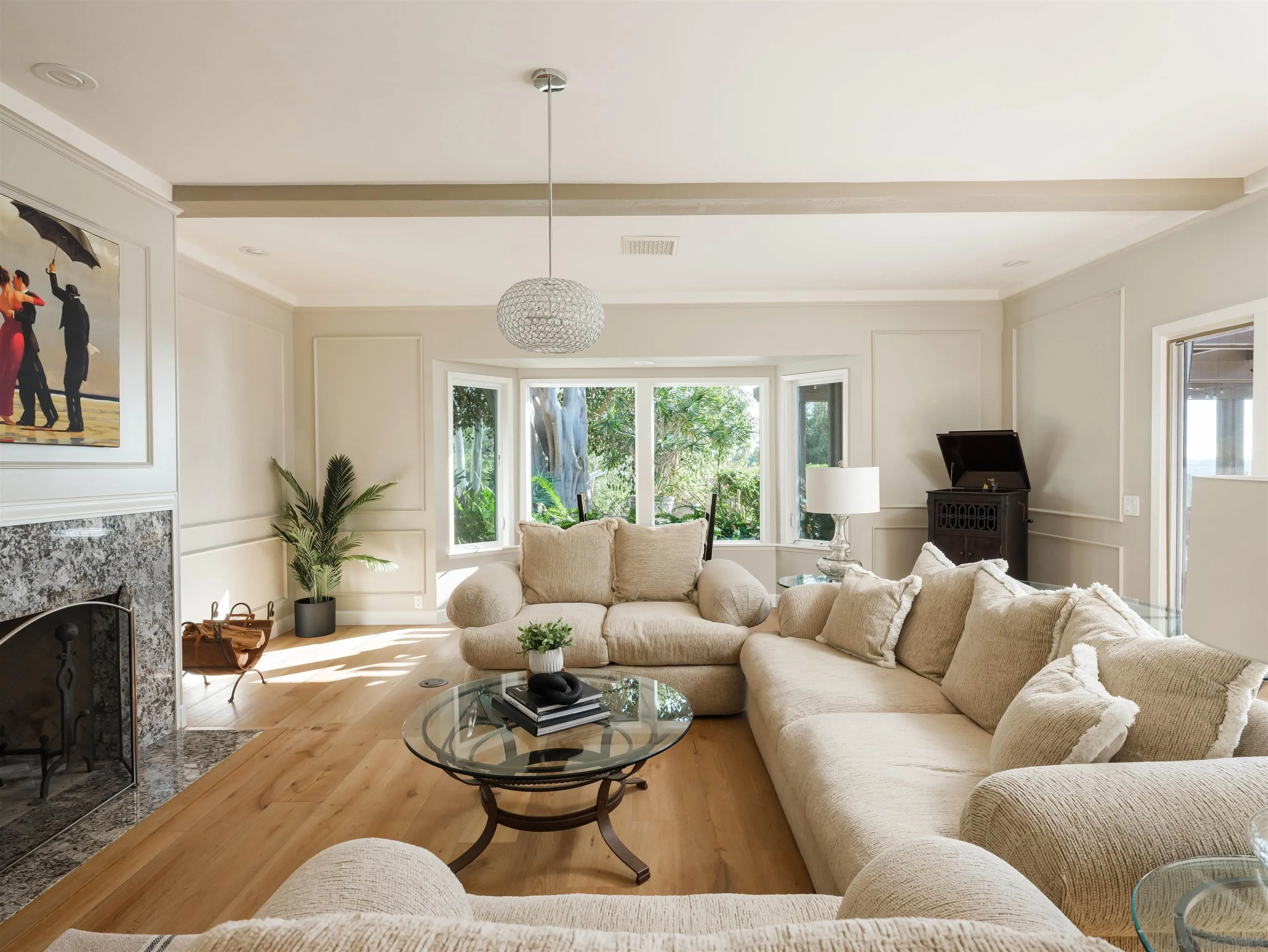 17136 El Mirador Rancho Santa Fe, CA 92067 - Photo 16 of 58 a living room with furniture and a fireplace
