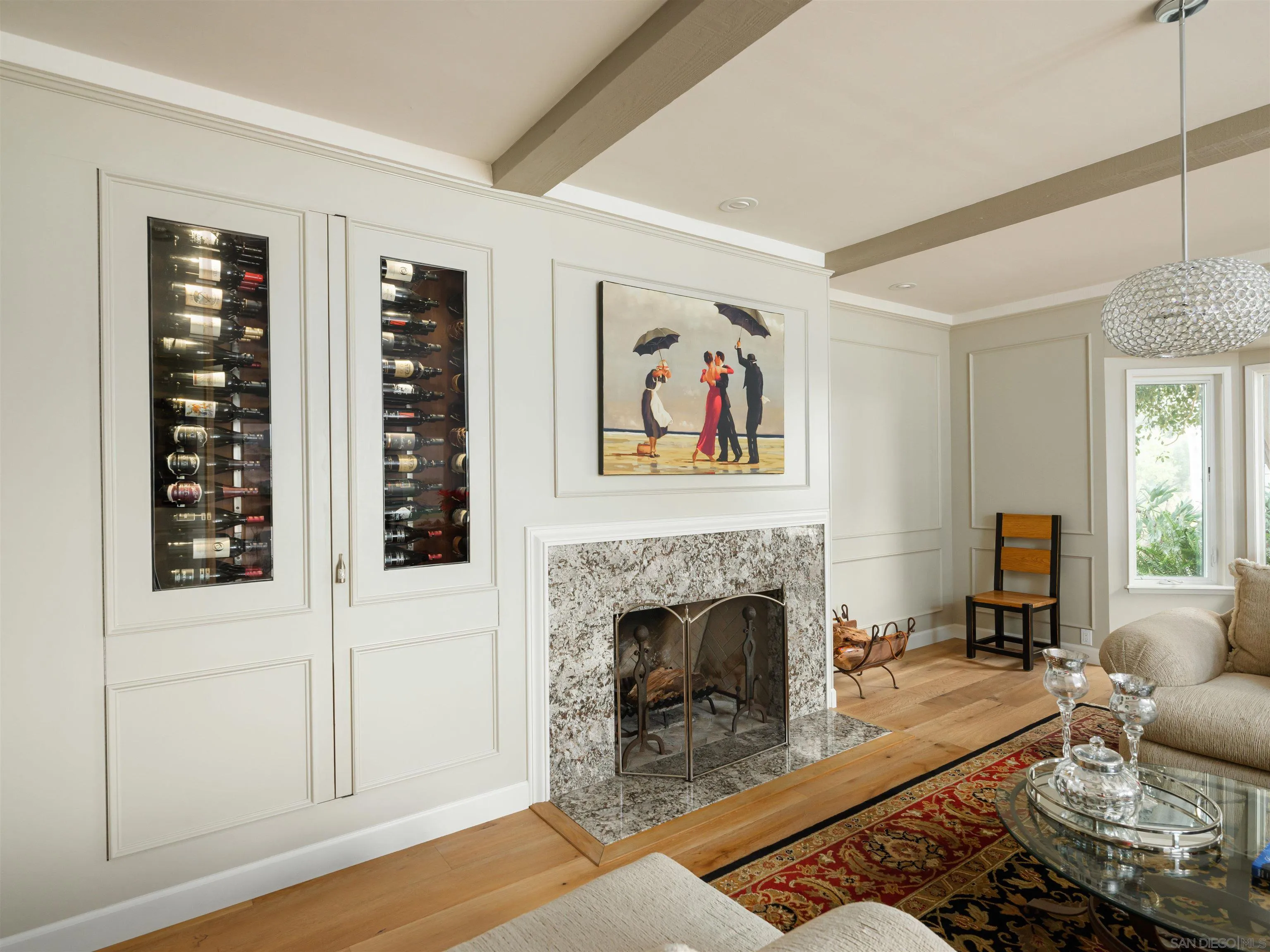 17136 El Mirador Rancho Santa Fe, CA 92067 - Photo 17 of 58 a living room with furniture a fireplace and a window