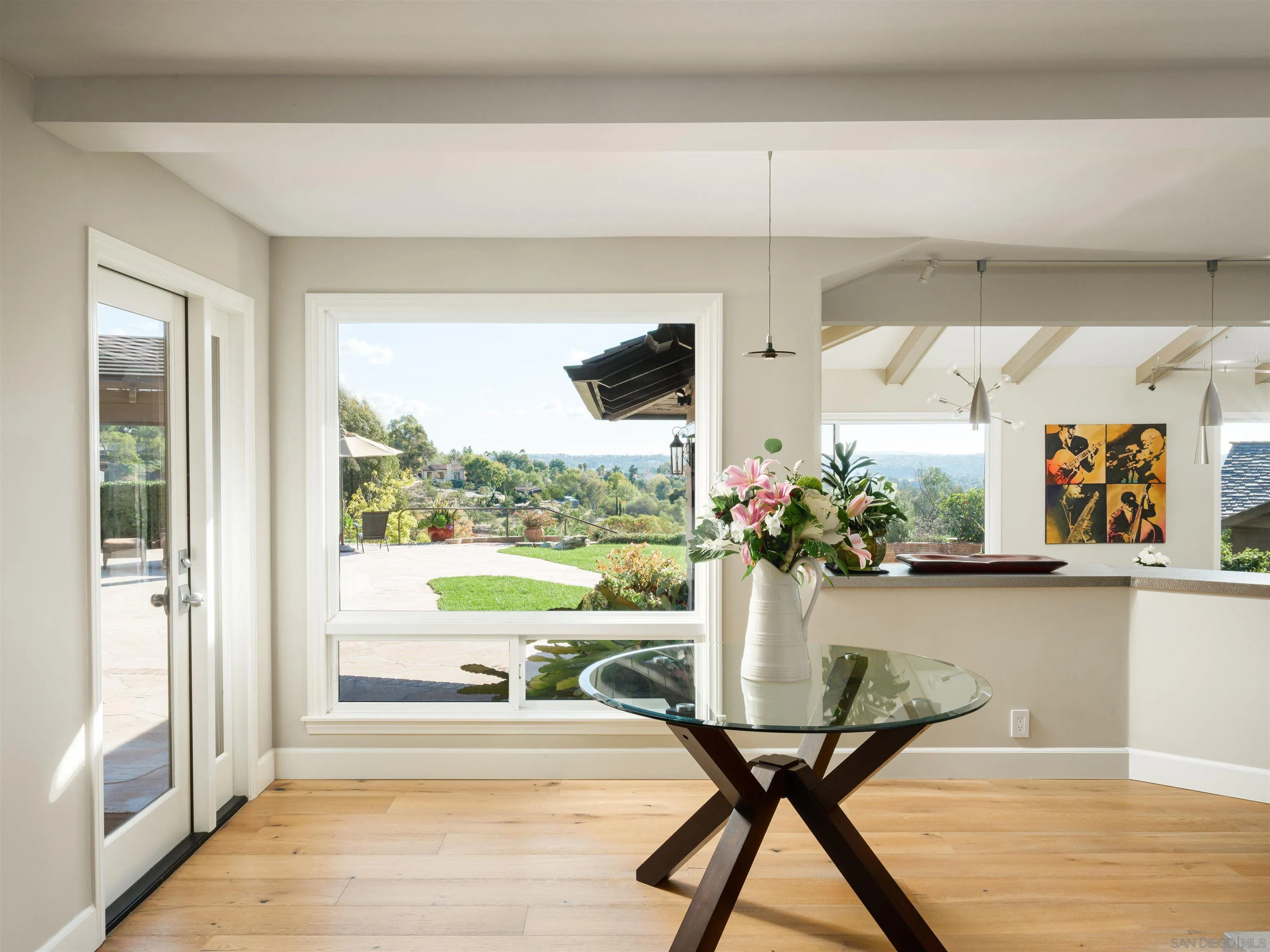 17136 El Mirador Rancho Santa Fe, CA 92067 - Photo 26 of 58 a view of a room with furniture and a floor to ceiling window