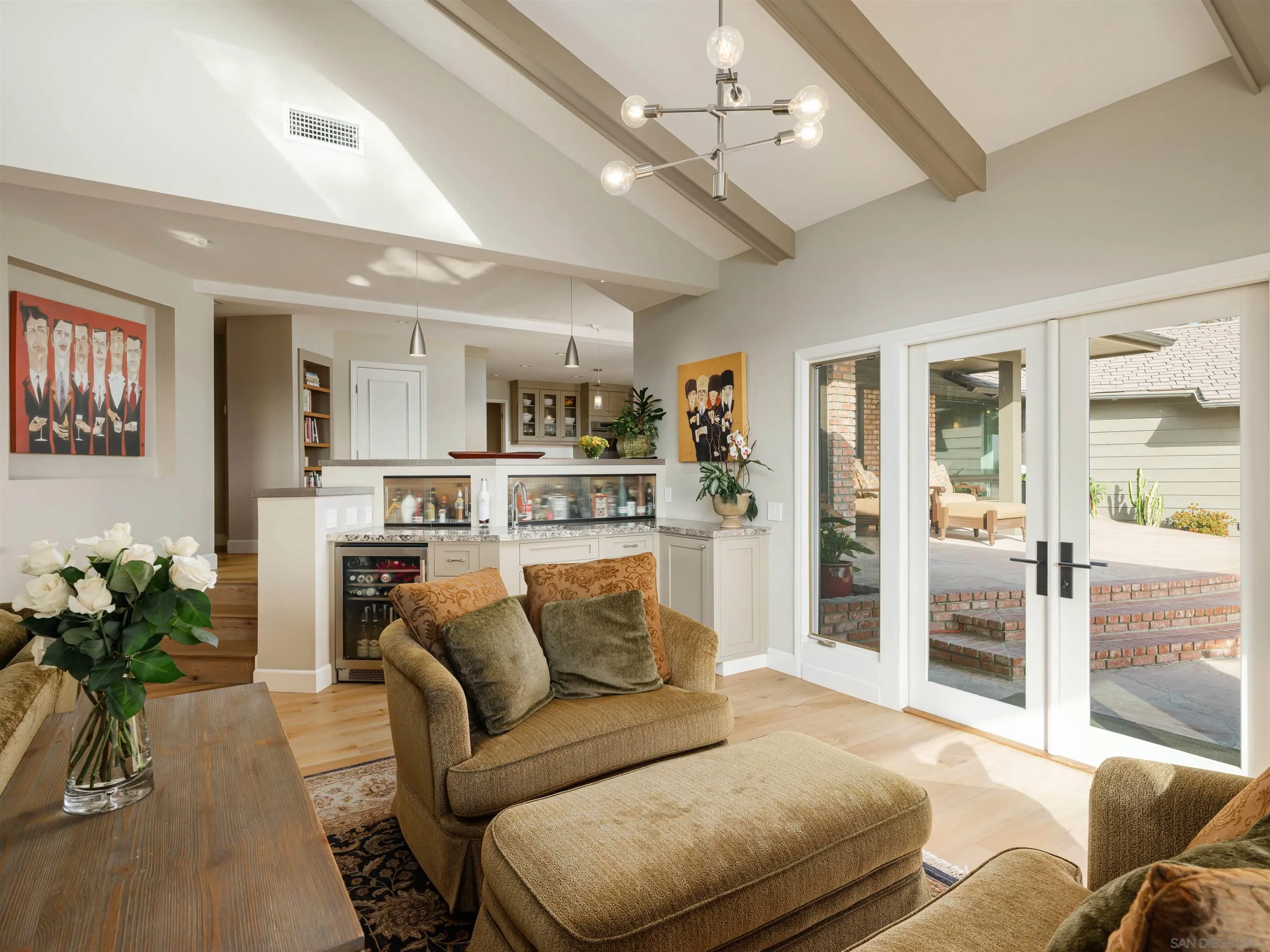17136 El Mirador Rancho Santa Fe, CA 92067 - Photo 28 of 58 a living room with furniture and a kitchen view