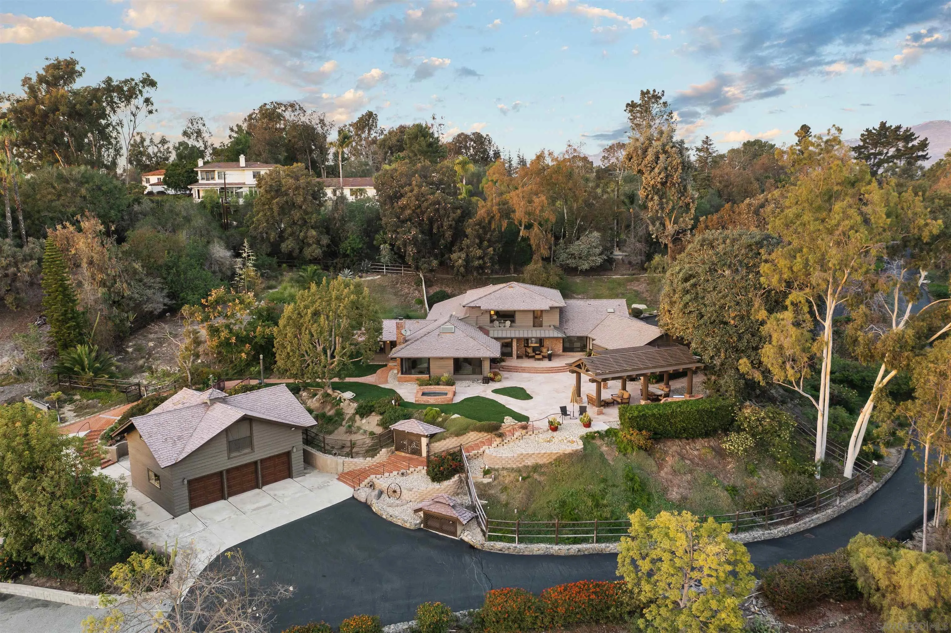17136 El Mirador Rancho Santa Fe, CA 92067 - Photo 3 of 58 a view of a house with a yard and sitting area