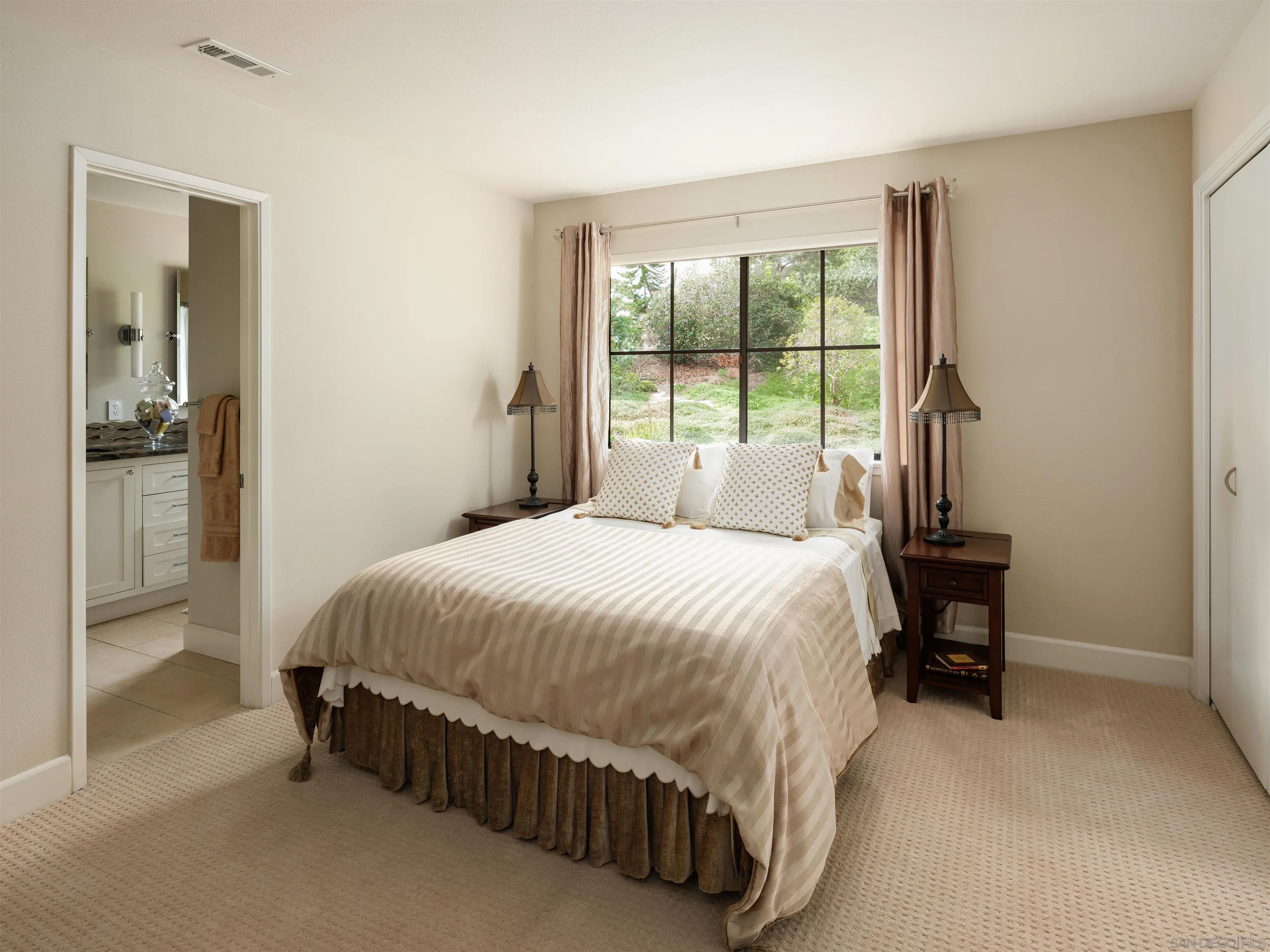 17136 El Mirador Rancho Santa Fe, CA 92067 - Photo 33 of 58 a bedroom with a bed and a window