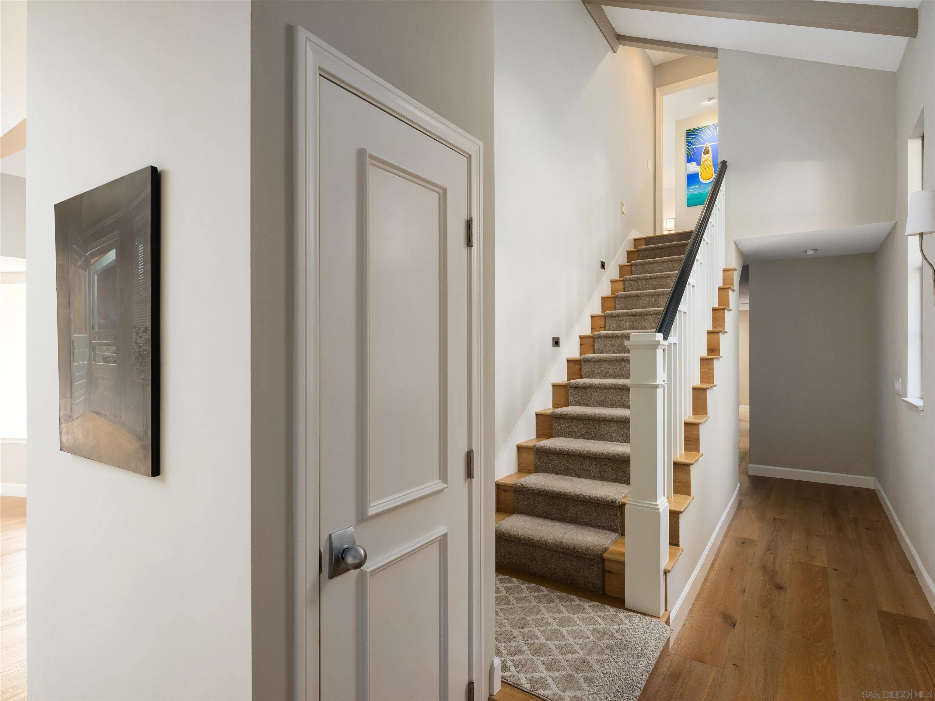 17136 El Mirador Rancho Santa Fe, CA 92067 - Photo 34 of 58 a view of a hallway with wooden floor and entryway