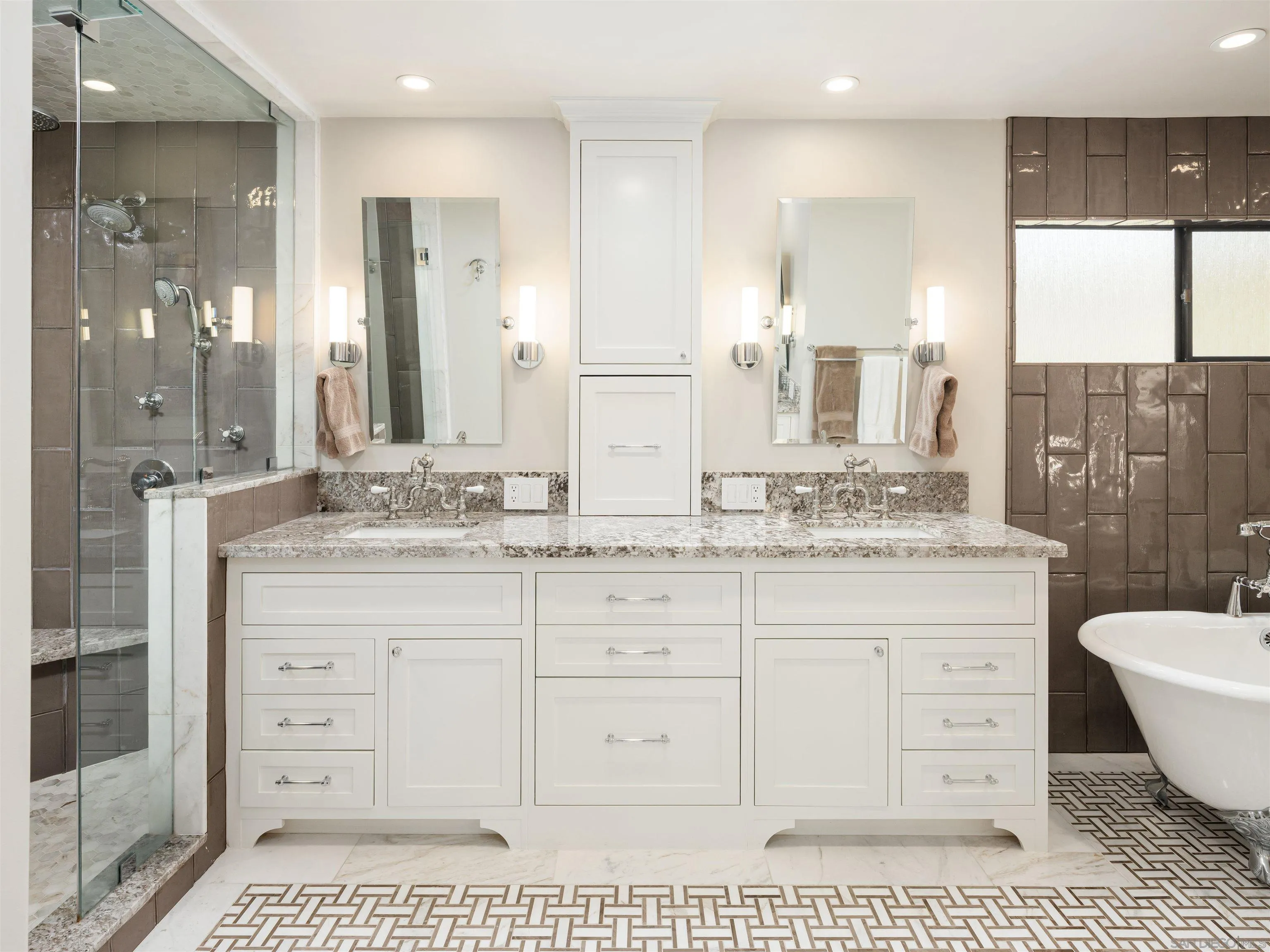 17136 El Mirador Rancho Santa Fe, CA 92067 - Photo 41 of 58 a bathroom with a granite countertop sink a toilet a mirror and shower