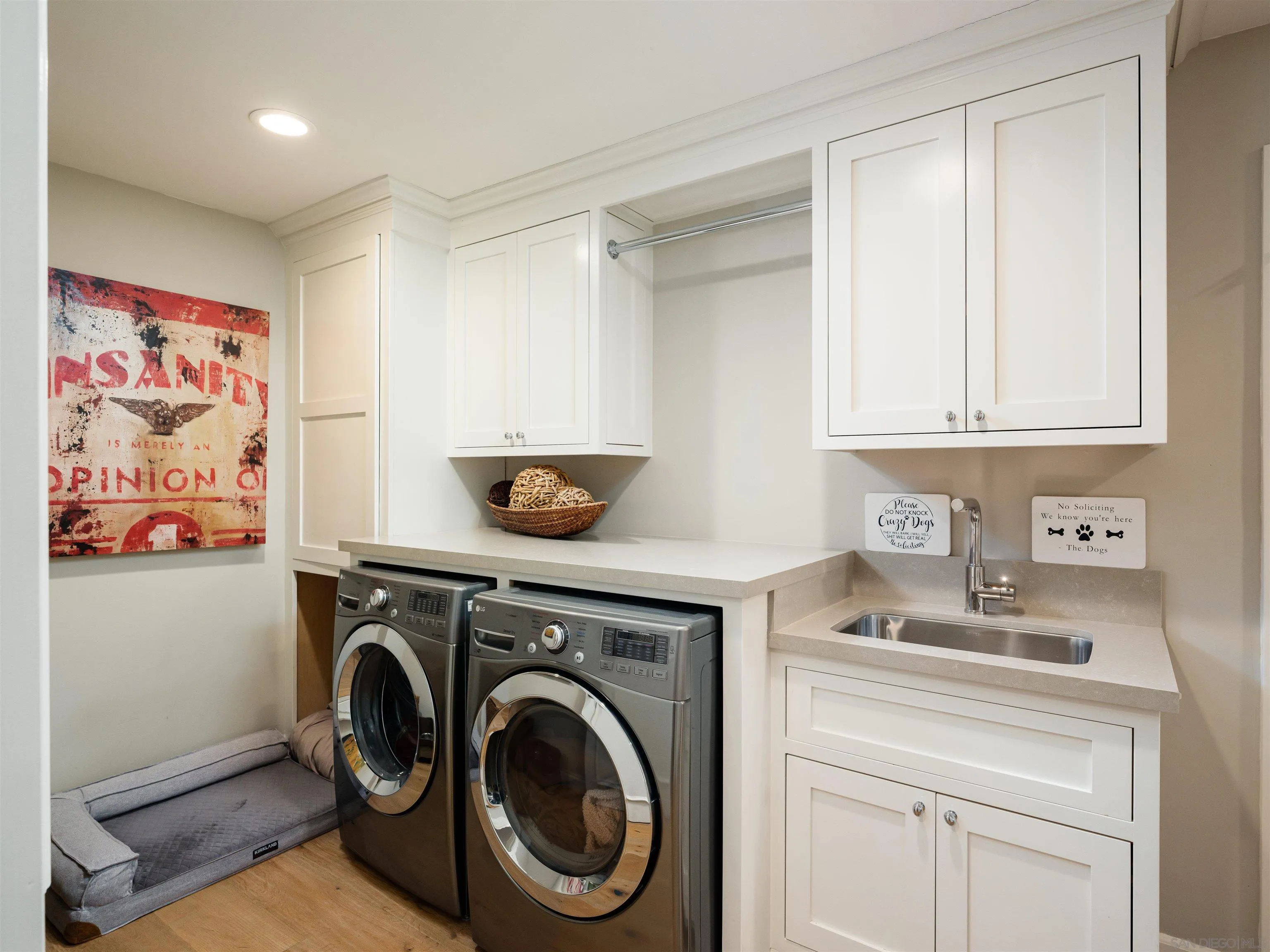 17136 El Mirador Rancho Santa Fe, CA 92067 - Photo 43 of 58 a utility room with sink dryer and washer
