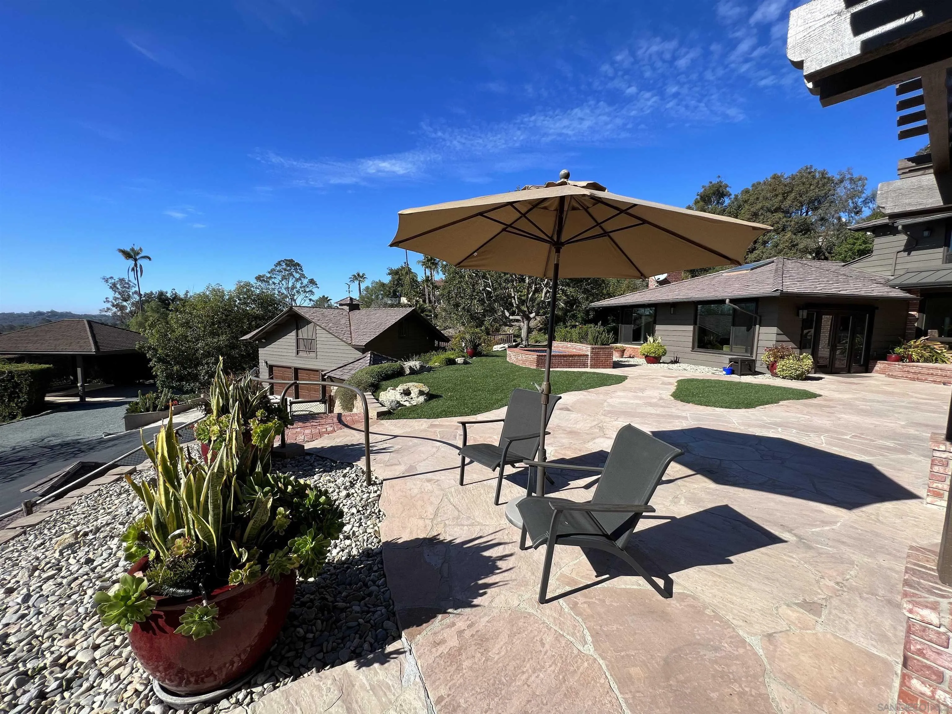 17136 El Mirador Rancho Santa Fe, CA 92067 - Photo 47 of 58 a view of a backyard with sitting area