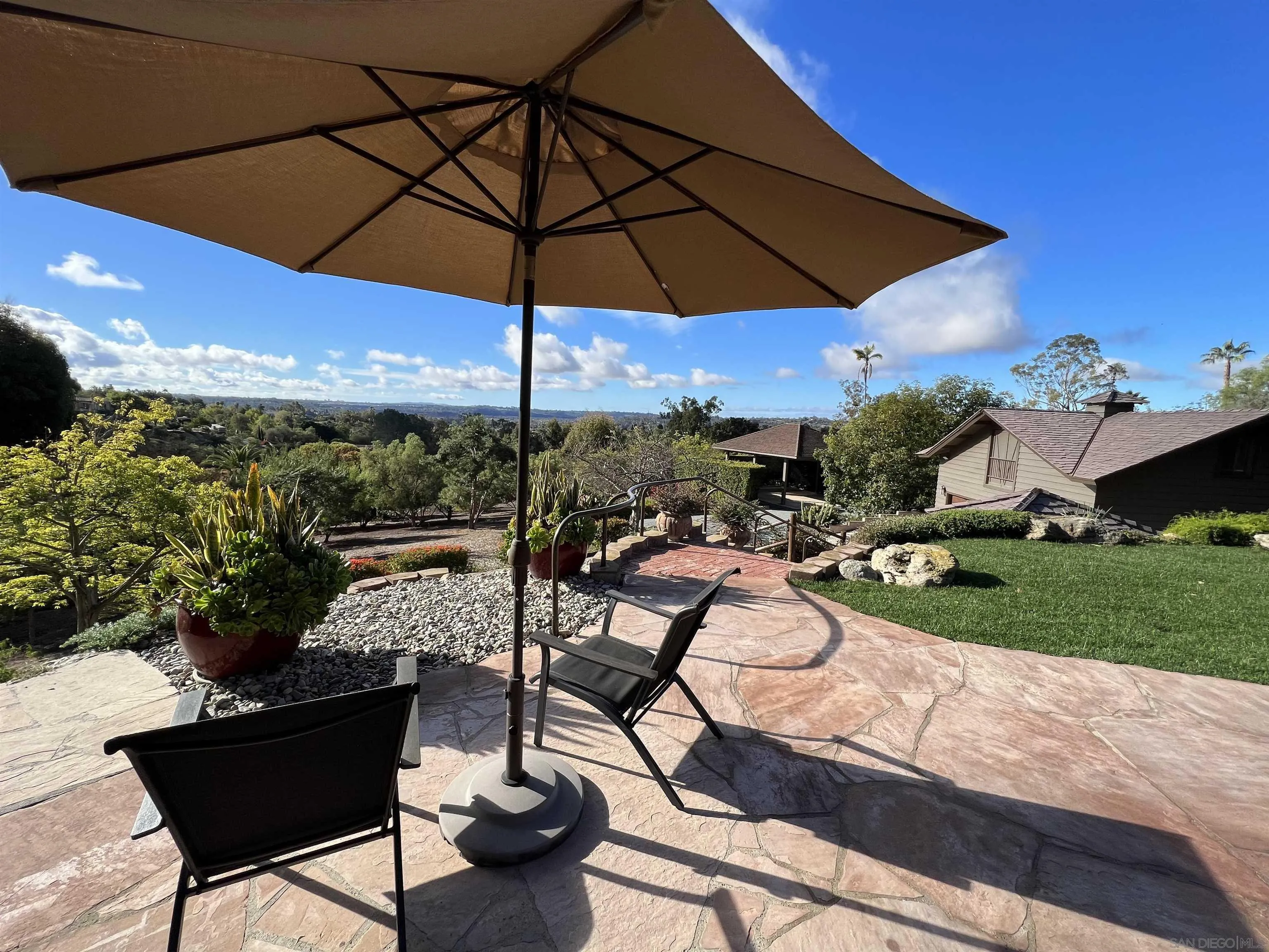 17136 El Mirador Rancho Santa Fe, CA 92067 - Photo 48 of 58 a view of a patio with furniture and backyard
