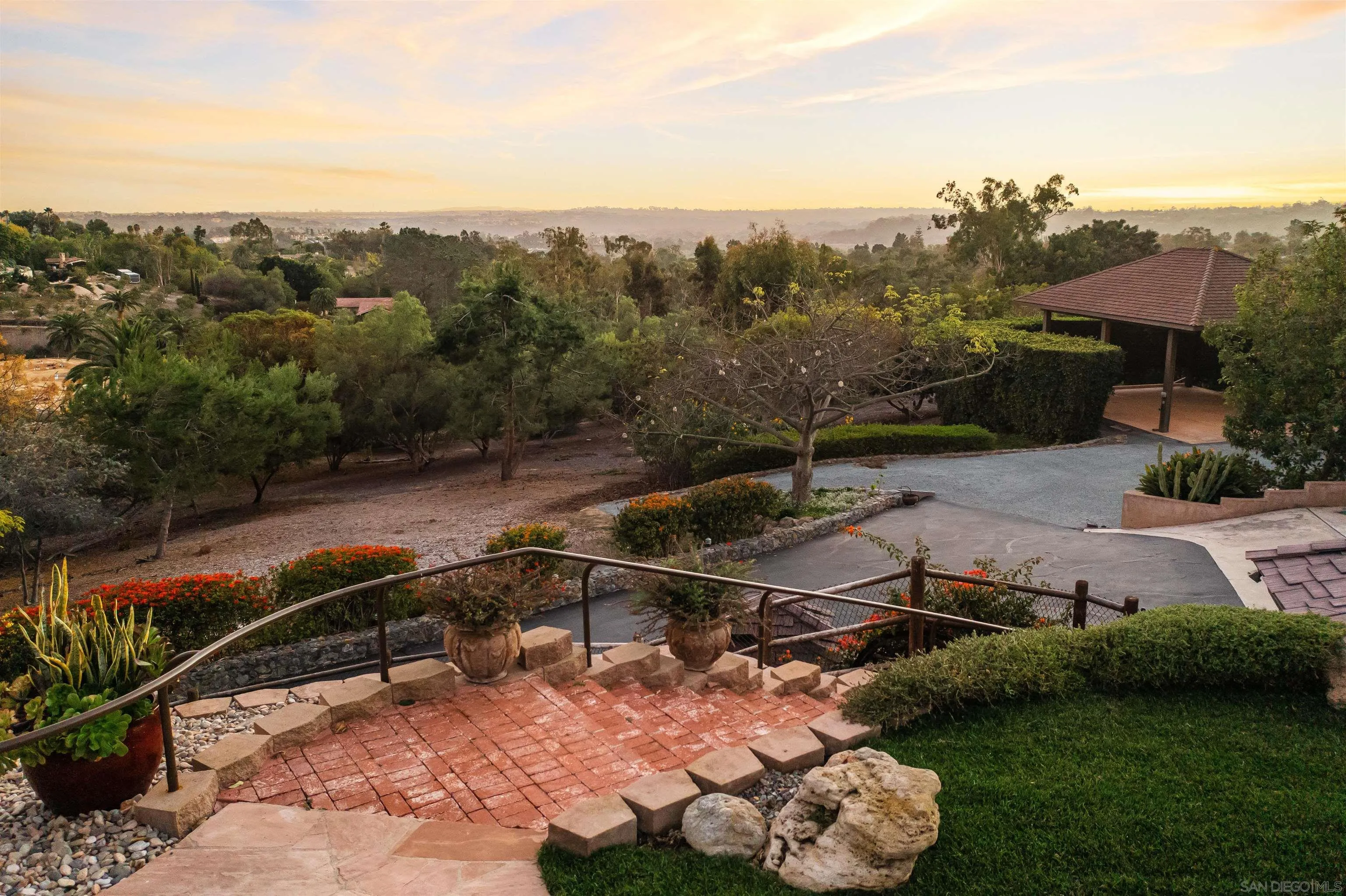 17136 El Mirador Rancho Santa Fe, CA 92067 - Photo 10 of 58 a view of a backyard with plants