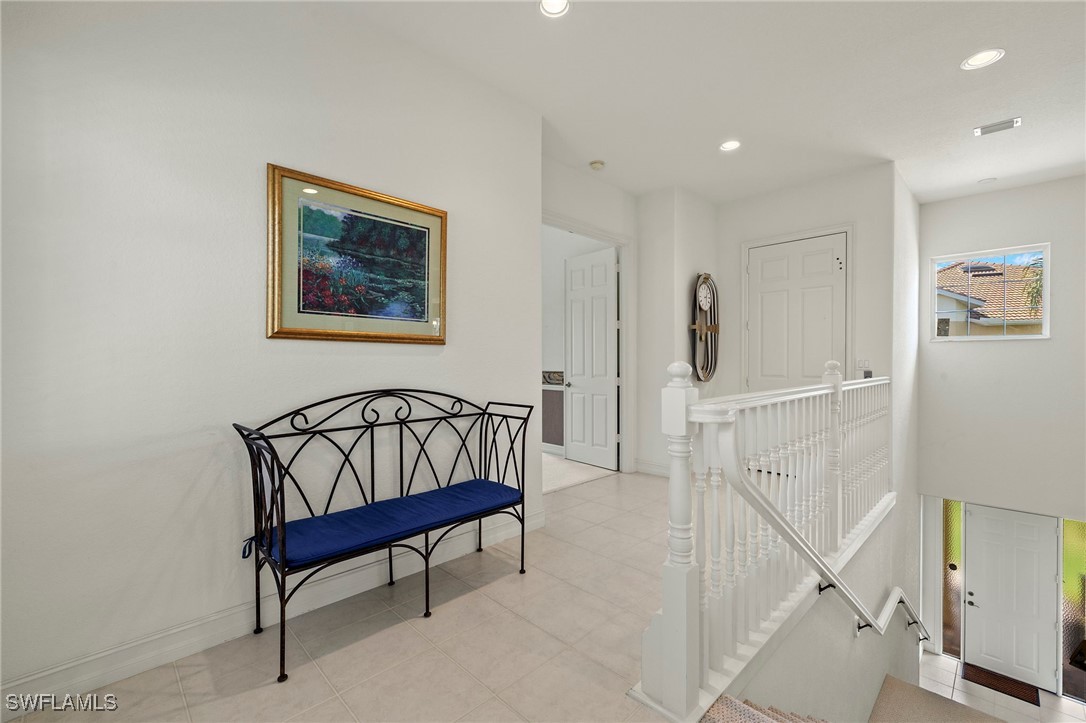 6035 Trophy Drive, Unit 103 Naples, FL 34110 - Photo 21 of 44 a view of a hallway with interior of the house