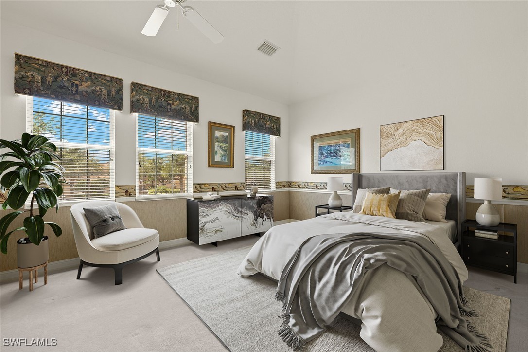 6035 Trophy Drive, Unit 103 Naples, FL 34110 - Photo 27 of 44 a spacious bedroom with a bed and a large window