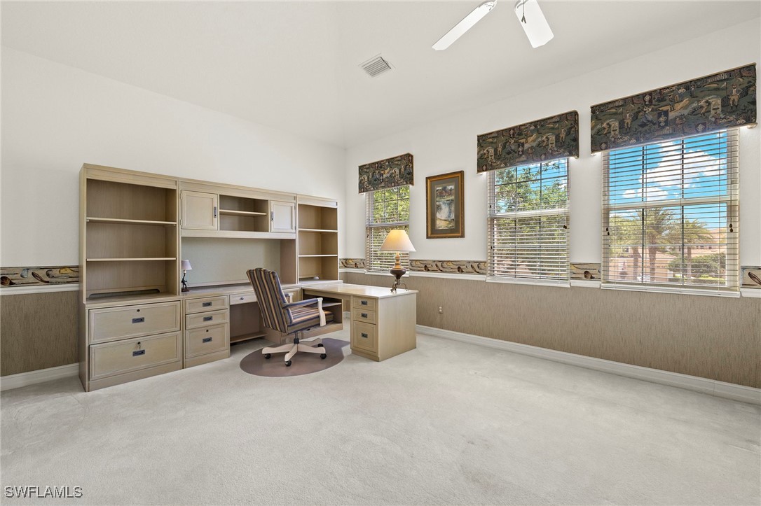 6035 Trophy Drive, Unit 103 Naples, FL 34110 - Photo 28 of 44 a room with a workspace