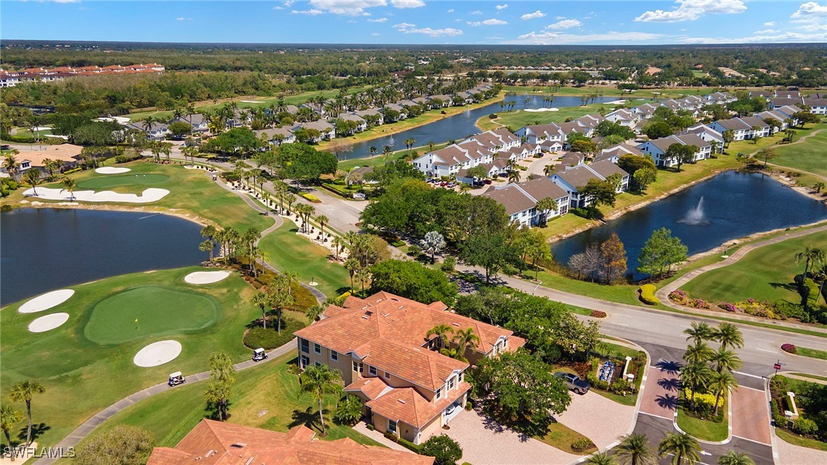 6035 Trophy Drive, Unit 103 Naples, FL 34110 - Photo 37 of 44 an aerial view of residential houses with outdoor space