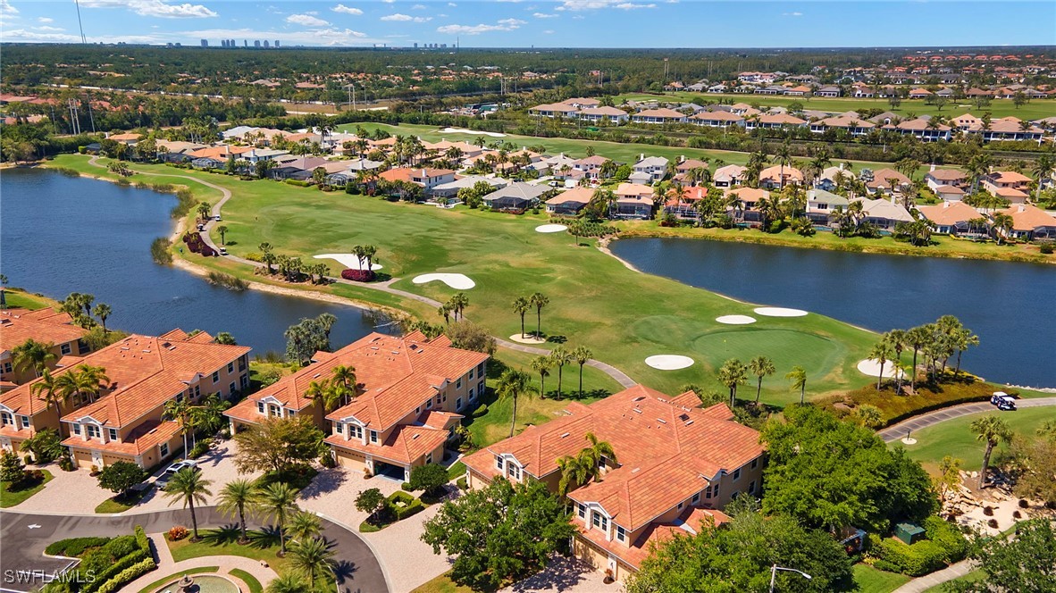 6035 Trophy Drive, Unit 103 Naples, FL 34110 - Photo 38 of 44 an aerial view of residential houses with outdoor space