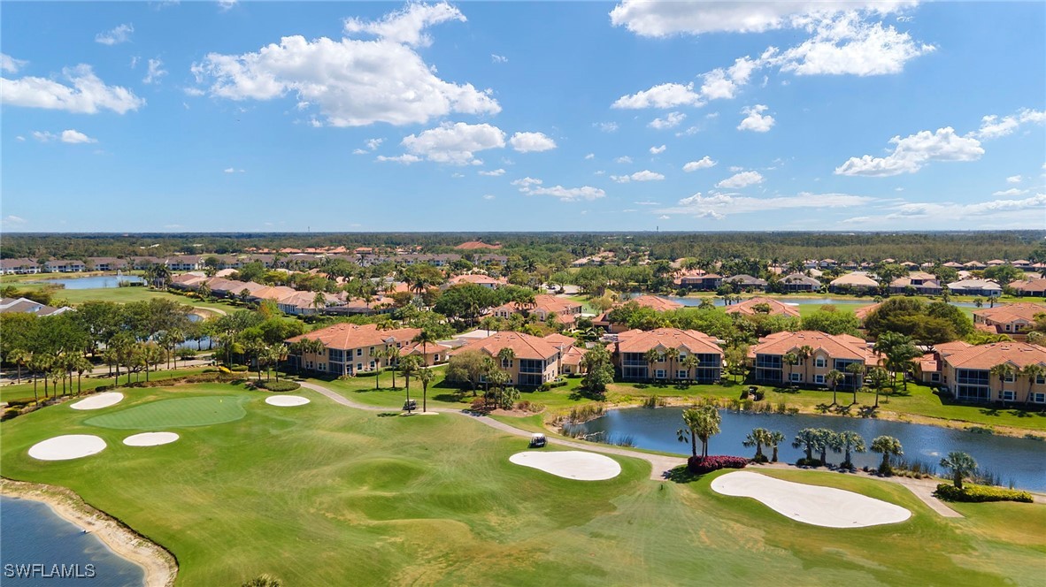 6035 Trophy Drive, Unit 103 Naples, FL 34110 - Photo 41 of 44 a view of a city with lots of residential buildings ocean and mountain view in back