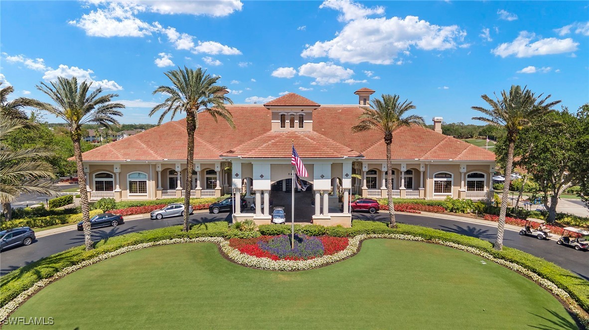 6035 Trophy Drive, Unit 103 Naples, FL 34110 - Photo 42 of 44 a front view of a house with swimming pool and porch