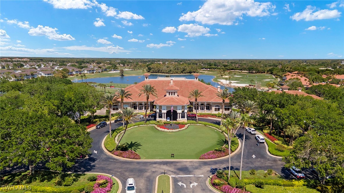 6035 Trophy Drive, Unit 103 Naples, FL 34110 - Photo 43 of 44 a view of a swimming pool with lounge chair