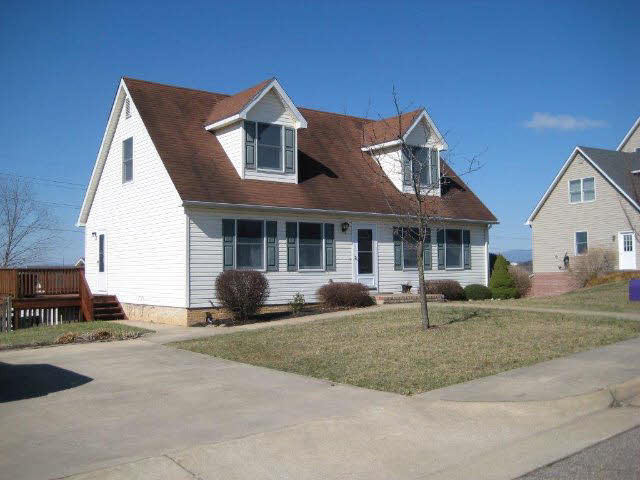 2171 Whispering Springs Road Harrisonburg, VA 22801 - Photo 1 of 11 a front view of a house with garden