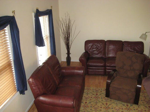 2171 Whispering Springs Road Harrisonburg, VA 22801 - Photo 8 of 11 a living room with furniture and a flat screen tv