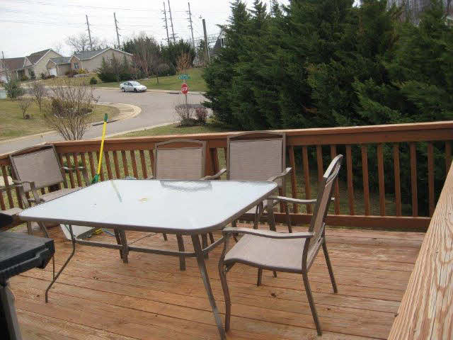 2171 Whispering Springs Road Harrisonburg, VA 22801 - Photo 10 of 11 a view of a balcony with wooden floor and outdoor seating