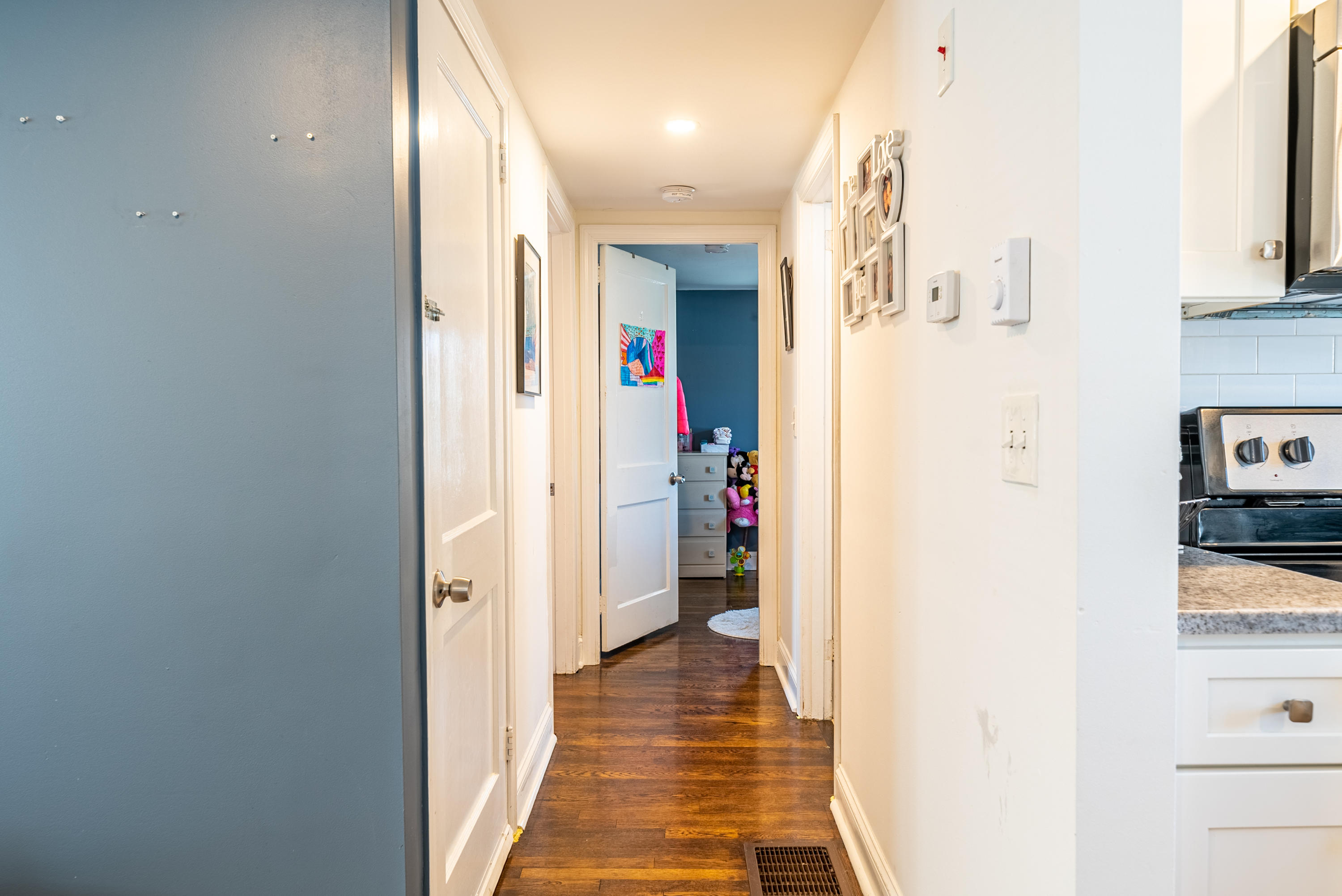 15 Brookshire Road Hyannis, MA 02601 - Photo 15 of 33 a view of a hallway with wooden floor and staircase