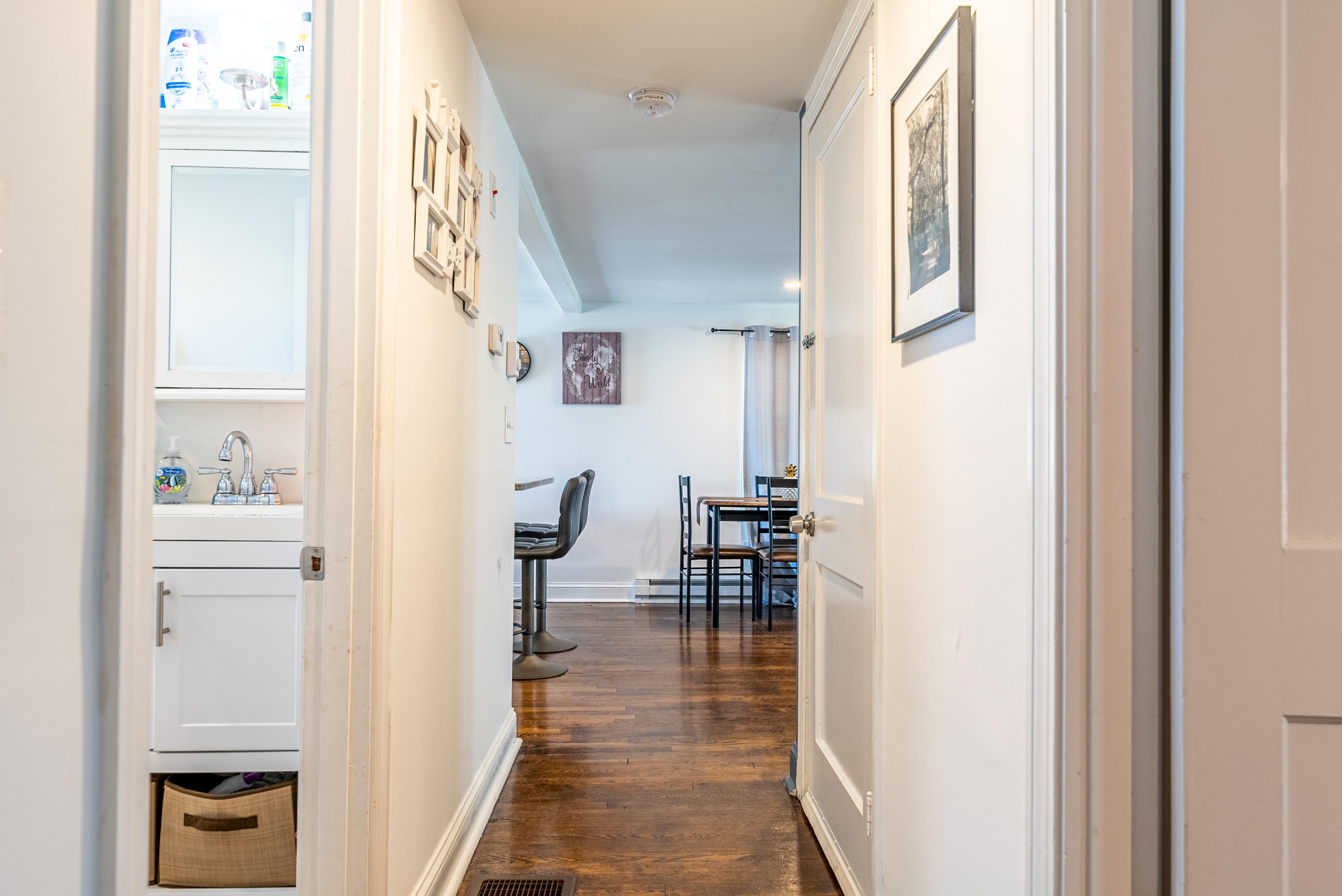 15 Brookshire Road Hyannis, MA 02601 - Photo 19 of 33 a view of a hallway with wooden floor and dining room
