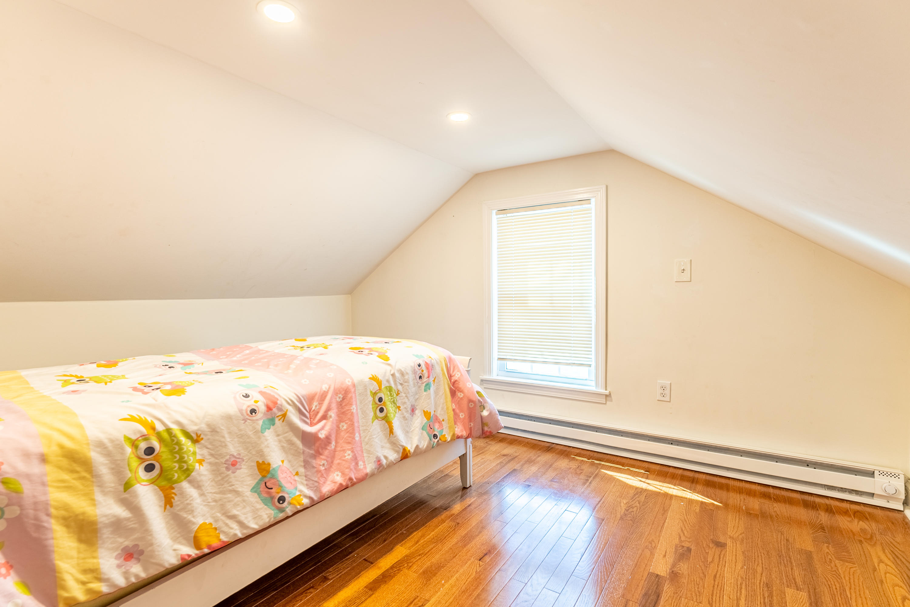 15 Brookshire Road Hyannis, MA 02601 - Photo 24 of 33 a bedroom with a bed and a window