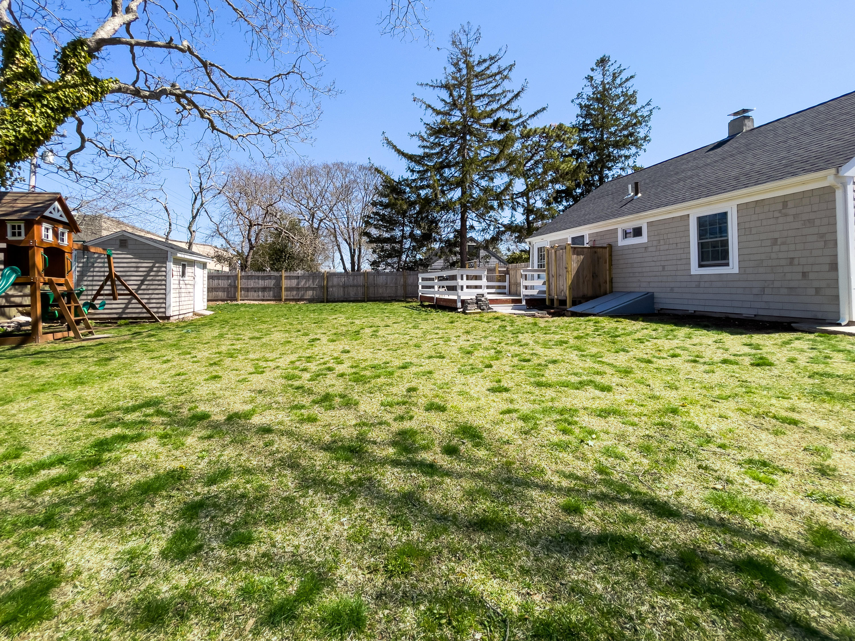 15 Brookshire Road Hyannis, MA 02601 - Photo 33 of 33 a backyard of a house with large tree