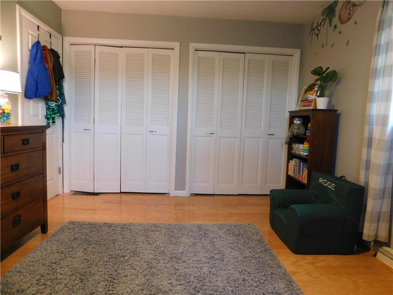 440 Mount Morris Road Mount Morris, PA 15349 - Photo 30 of 50 a view of a bedroom with wooden floor and closet