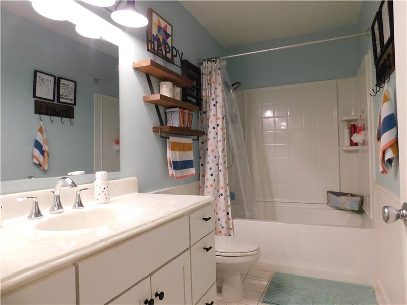 440 Mount Morris Road Mount Morris, PA 15349 - Photo 31 of 50 a bathroom with a sink a toilet and shower