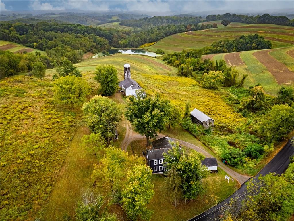 580 Green Valley Road Eighty Four, PA 15330 - Photo 2 of 45 a view of a lake with a building in the background