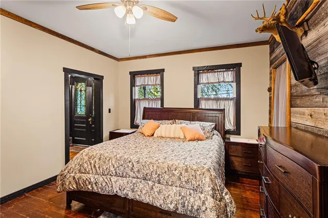 a bathroom with a sink a toilet and shower curtain