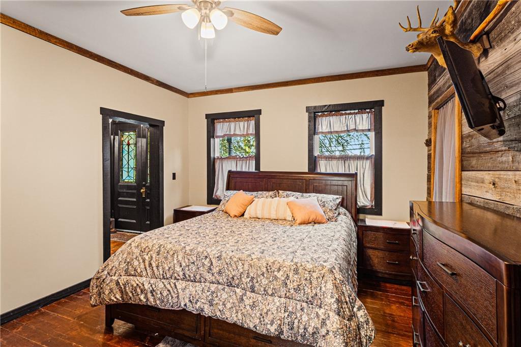 580 Green Valley Road Eighty Four, PA 15330 - Photo 21 of 45 a bedroom with a bed and a chandelier