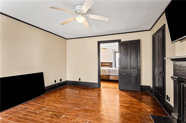 a view of a hallway with a chandelier and entryway