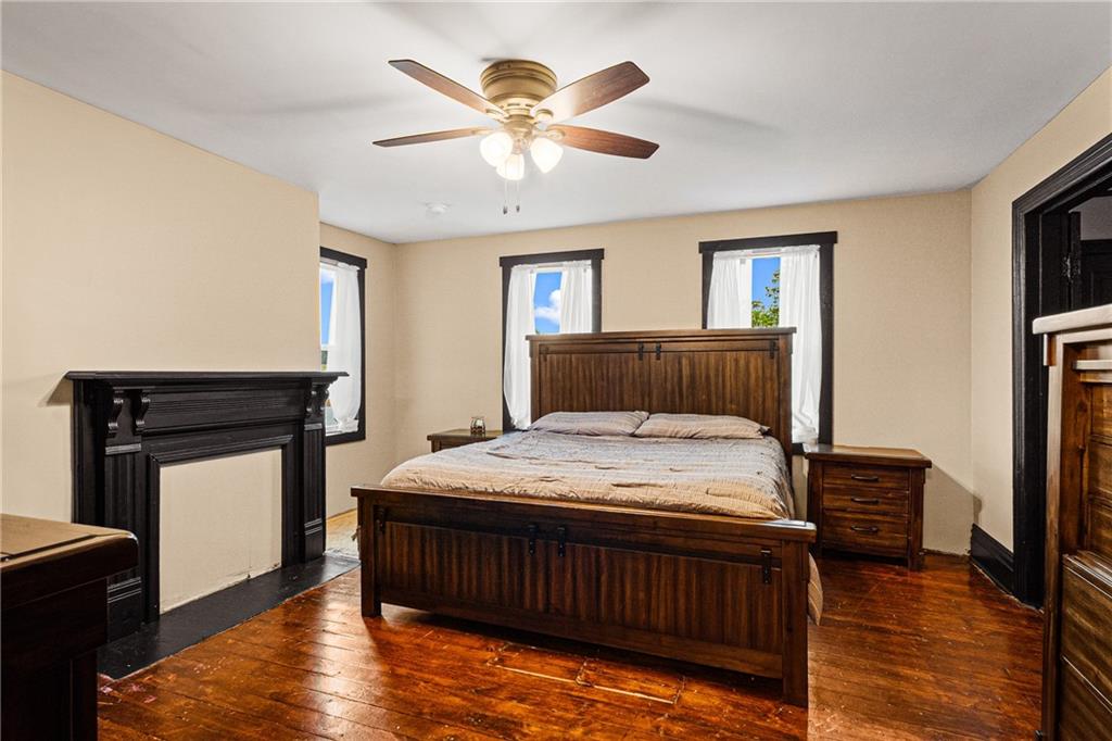 580 Green Valley Road Eighty Four, PA 15330 - Photo 34 of 45 a bedroom with a bed and a ceiling fan